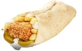 Albaik chicken fillet sandwich with crispy chicken, lettuce, mayo, and fries