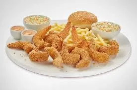 Albaik jumbo shrimp meal with golden shrimp, cocktail sauce, and fries.